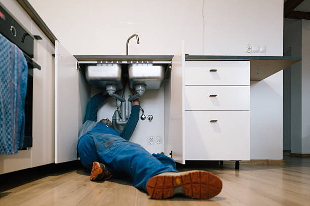 Professional Drain Cleaning technician working in Pikesville, MD